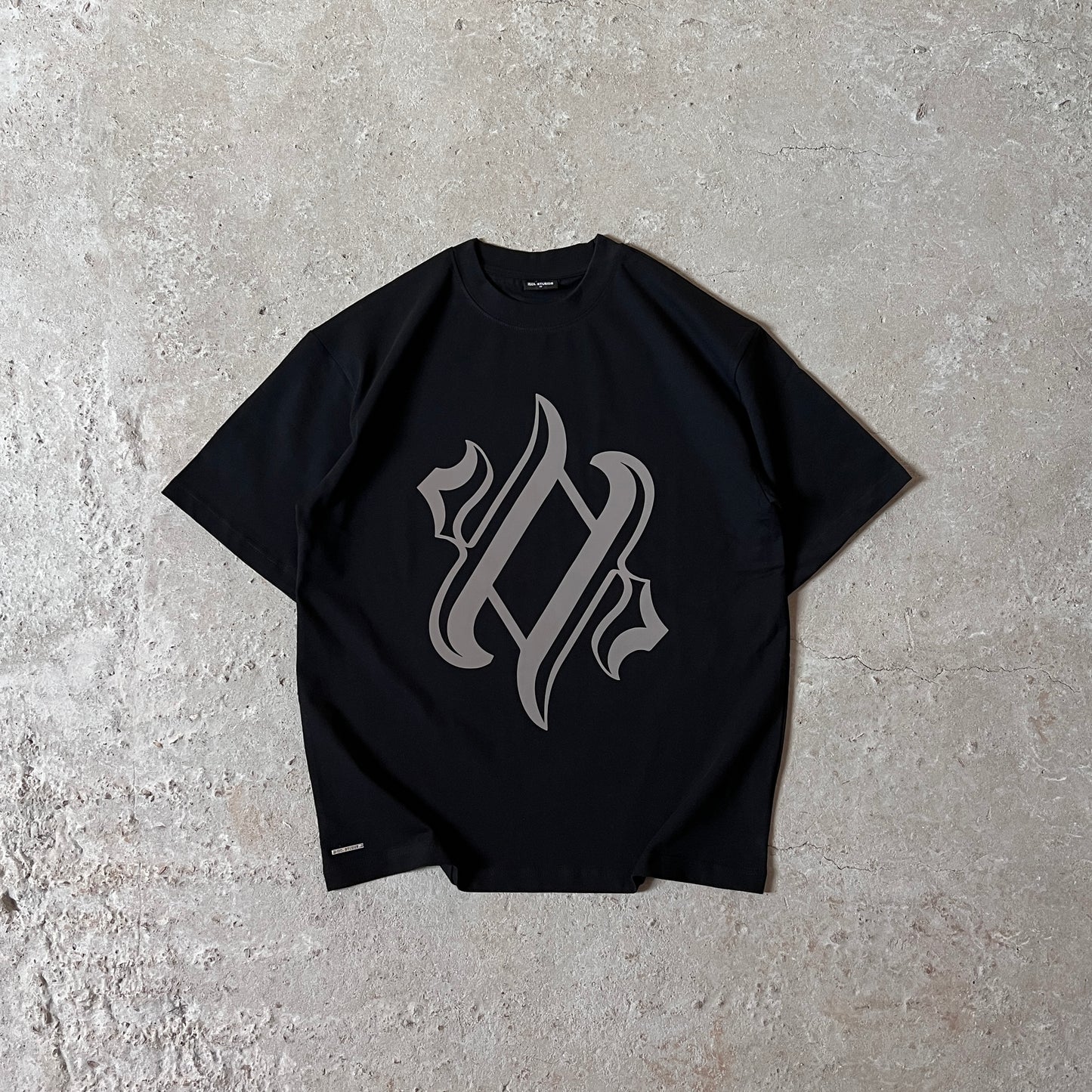 Reflective logo - black